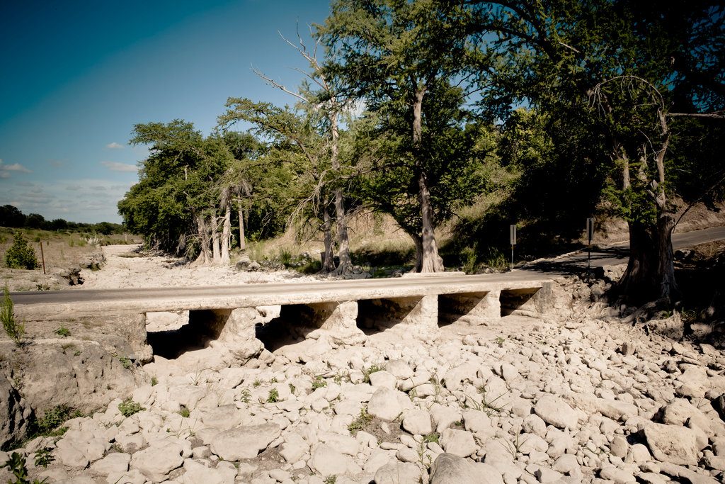 A drought-ravaged portion of the Guadalupe River near Texas's Canyon Lake in July. Credit Daniel Borris for The New York Times.